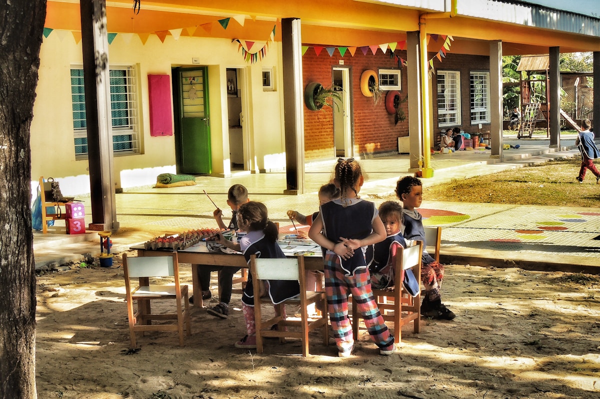Children learning together in a bright preschool classroom